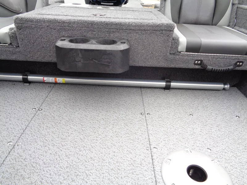 Slide: The Image of 2024 Lund 1775 Adventure SS boat interior with seating and storage features. - 14