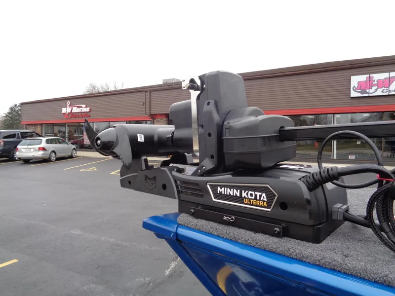 Slide: The Image of 2024 Lund 1775 Adventure SS with Minn Kota Ulterra motor in parking lot. - 7