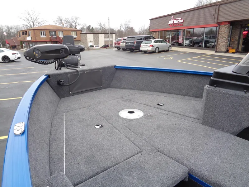 Slide: The Image of 2024 Lund 1775 Adventure SS boat with spacious deck in parking lot. - 8