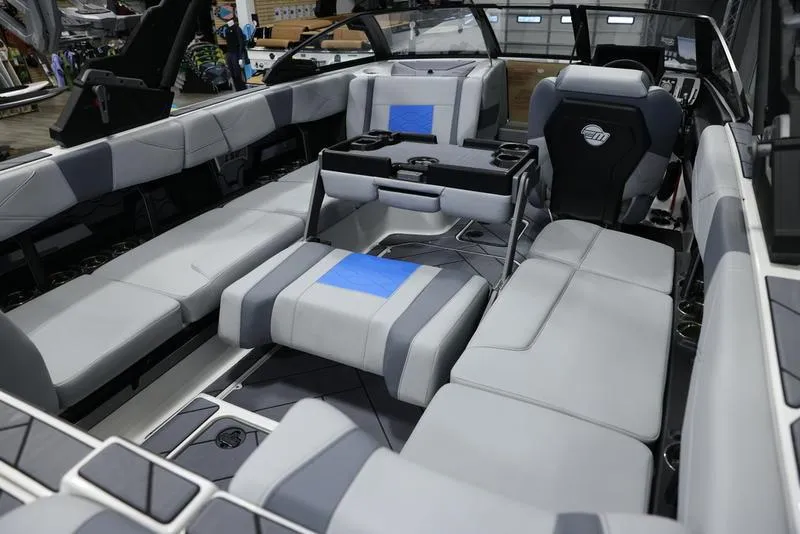 Slide: The Image of 2024 Malibu 23 LSV boat interior with luxurious seating and modern design. - 18
