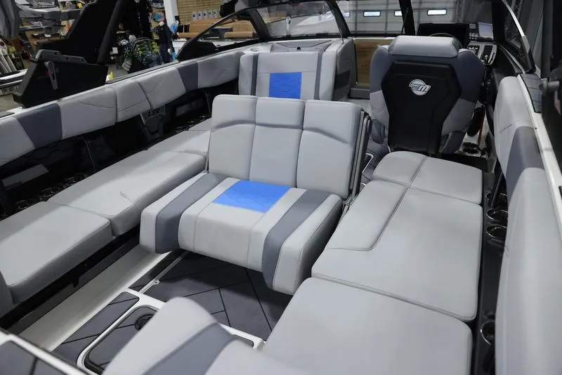 Slide: The Image of 2024 Malibu 23 LSV boat interior with luxurious seating and modern design. - 20