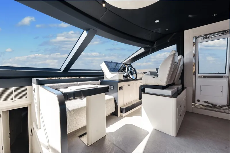 Slide: The Image of Interior helm station of 2024 Azimut Fly 78 yacht with panoramic windows. - 46