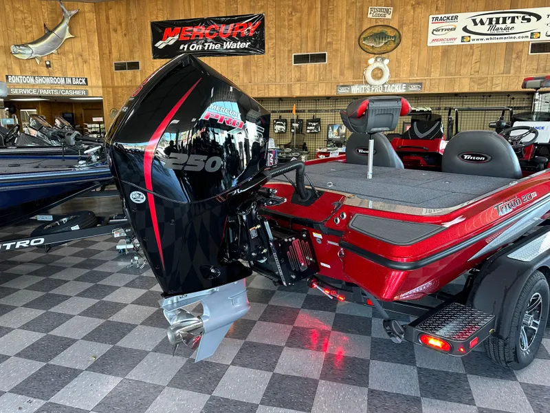 Slide: The Image of 2024 Triton 20XP Patriot boat with Mercury 250 outboard motor in showroom. - 8