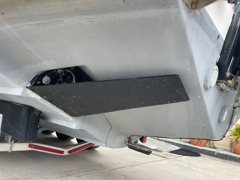 Slide: The Image of 1999 Venture 34 Center Console boat hull on trailer, close-up view. - 5