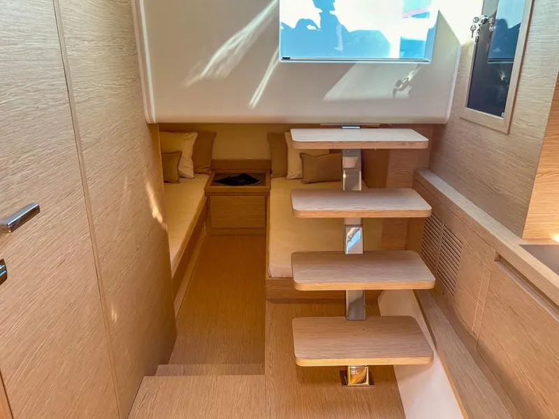 Slide: The Image of Interior of 2024 Solaris Power 40 Open yacht with modern wooden design. - 10