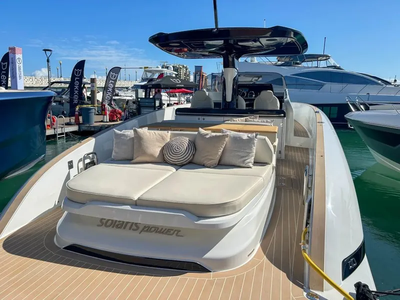 Slide: The Image of 2024 Solaris Power 40 Open luxury yacht at marina, featuring spacious sunbathing area. - 17