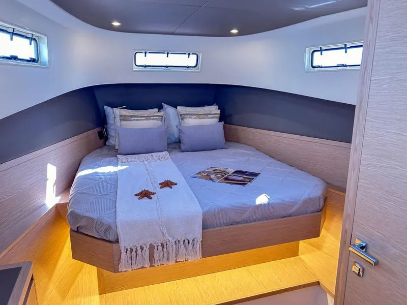 Slide: The Image of Luxurious cabin interior of 2024 Solaris Power 40 Open yacht with cozy bed and modern design. - 8