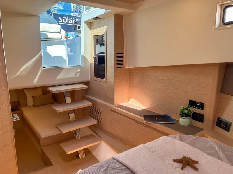 Slide: The Image of Interior of 2024 Solaris Power 40 Open yacht with modern wooden design. - 9