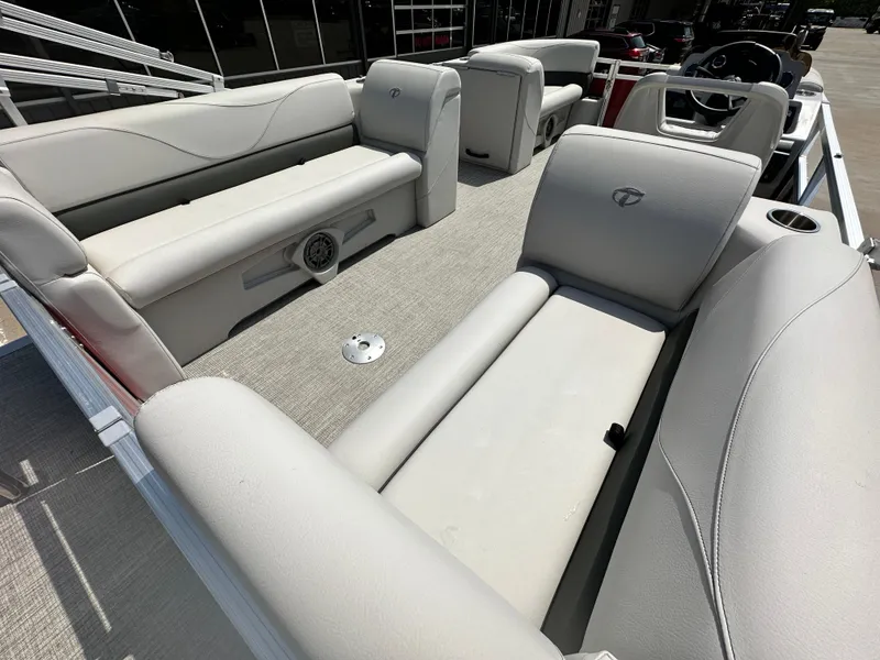 Slide: The Image of 2023 Tahoe Pontoon SLT Quad Lounge interior with plush seating and modern design. - 10