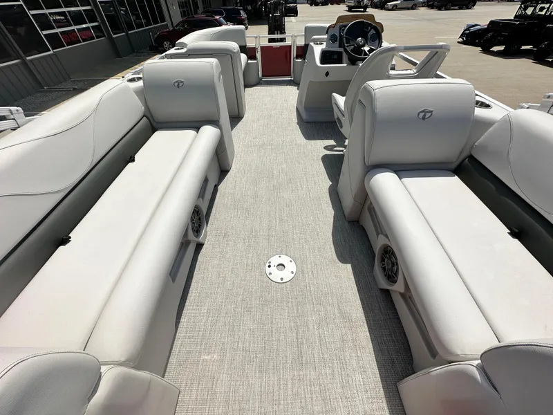 Slide: The Image of 2023 Tahoe Pontoon SLT Quad Lounge interior with spacious seating and modern design. - 8