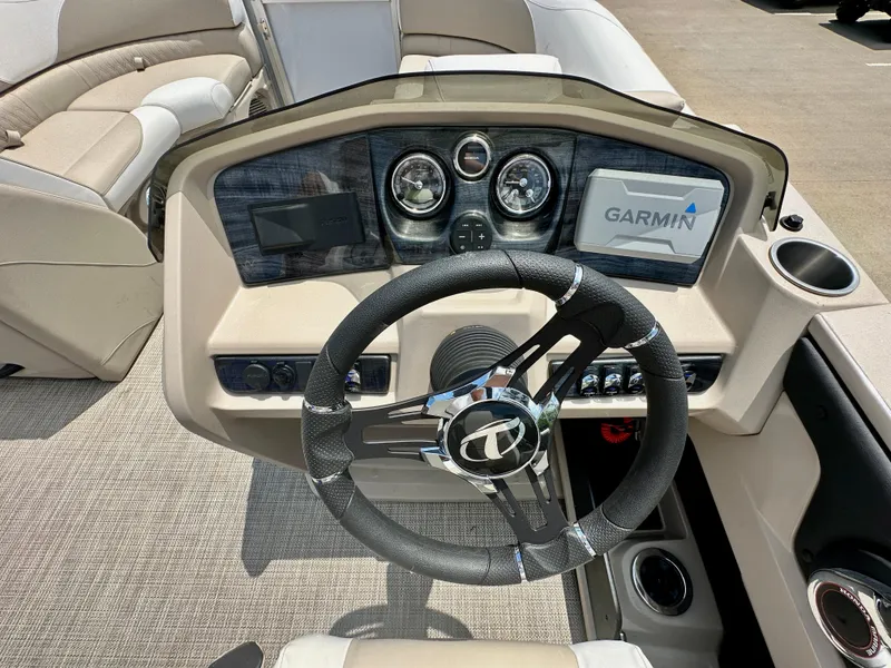 Slide: The Image of 2023 Tahoe Pontoon LTZ Rear Fish dashboard with Garmin navigation system. - 14