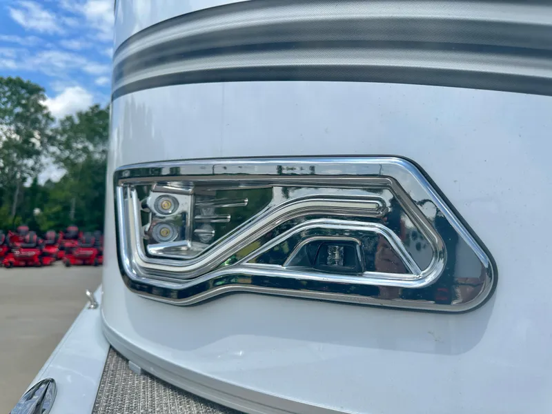 Slide: The Image of Close-up of 2023 Tahoe Pontoon LTZ Rear Fish boat's sleek chrome detail. - 6