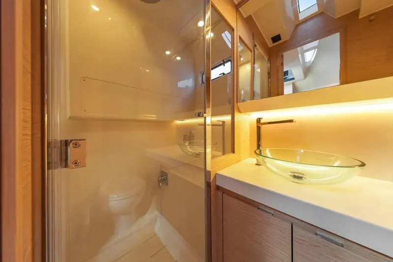 Slide: The Image of Luxurious bathroom interior of 2024 Solaris Power 44 Open yacht with glass sink and modern fixtures. - 20