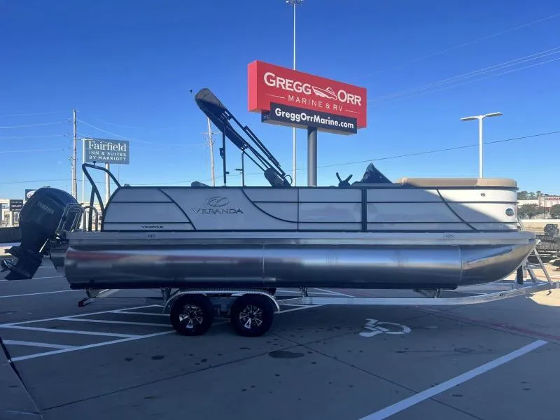 Slide: The Image of 2024 Veranda VR22VLB pontoon boat on trailer at Gregg Orr Marine & RV dealership. - 5