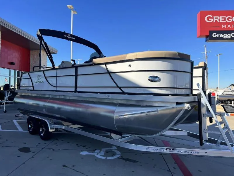 Slide: The Image of 2024 Veranda VR22VLB pontoon boat on a trailer at a dealership. - 6