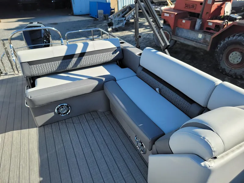 Slide: The Image of 2024 Godfrey SWEETWATER 2286 SFL pontoon boat interior with luxurious seating. - 11