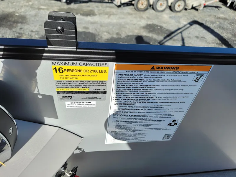 Slide: The Image of 2024 Godfrey SWEETWATER 2286 SFL capacity and warning labels. - 18