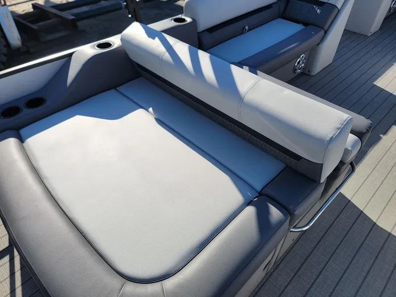 Slide: The Image of 2024 Godfrey SWEETWATER 2286 SFL boat interior seating area. - 22