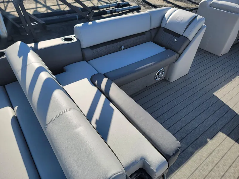 Slide: The Image of 2024 Godfrey SWEETWATER 2286 SFL pontoon boat interior with comfortable seating. - 24
