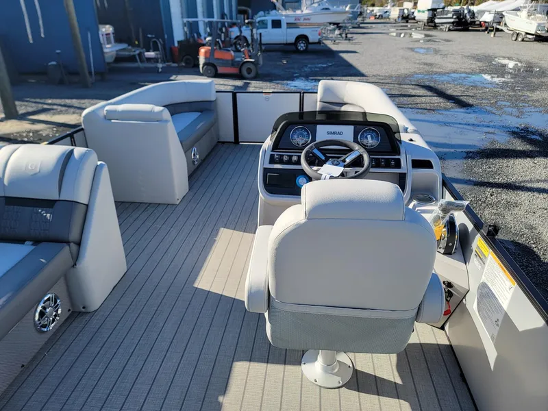 Slide: The Image of Interior of 2024 Godfrey SWEETWATER 2286 SFL pontoon boat with captain's chair and dashboard. - 25