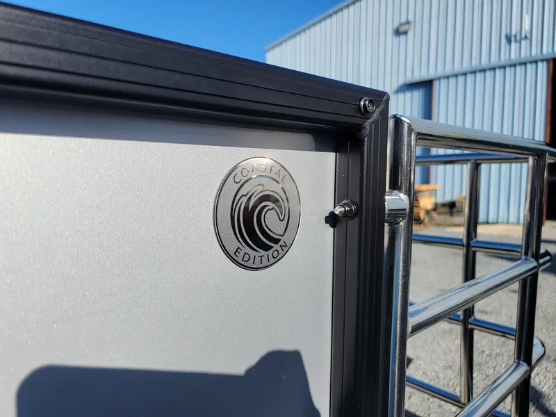 Slide: The Image of Close-up of 2024 Godfrey SWEETWATER 2286 SFL Coastal Edition emblem. - 33