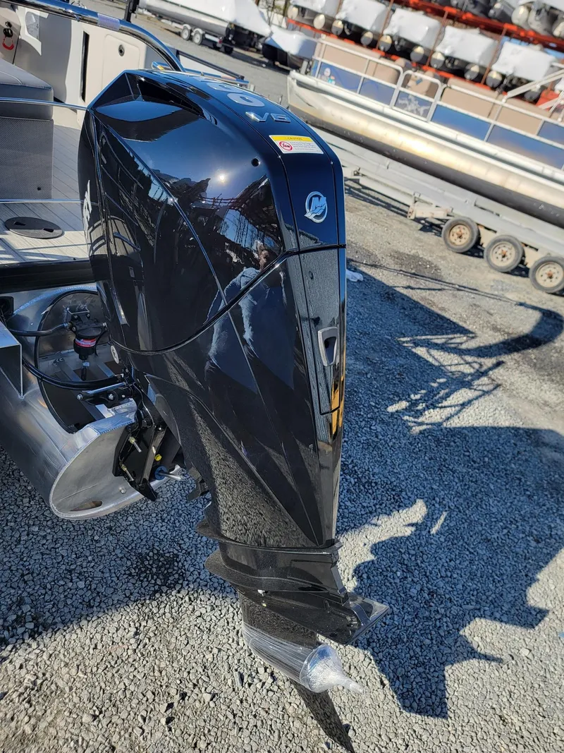 Slide: The Image of 2024 Godfrey SWEETWATER 2286 SFL boat with a powerful outboard motor. - 35