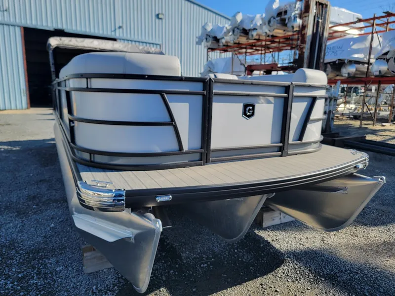 Slide: The Image of 2024 Godfrey SWEETWATER 2286 SFL pontoon boat in a storage yard. - 7