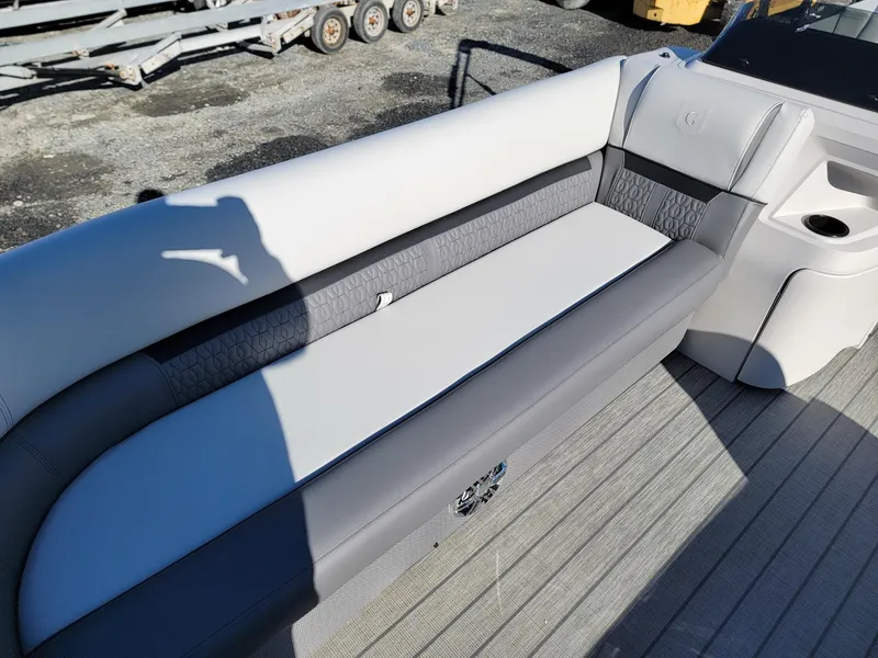 Slide: The Image of 2024 Godfrey SWEETWATER 2286 SFL boat interior seating area - 9