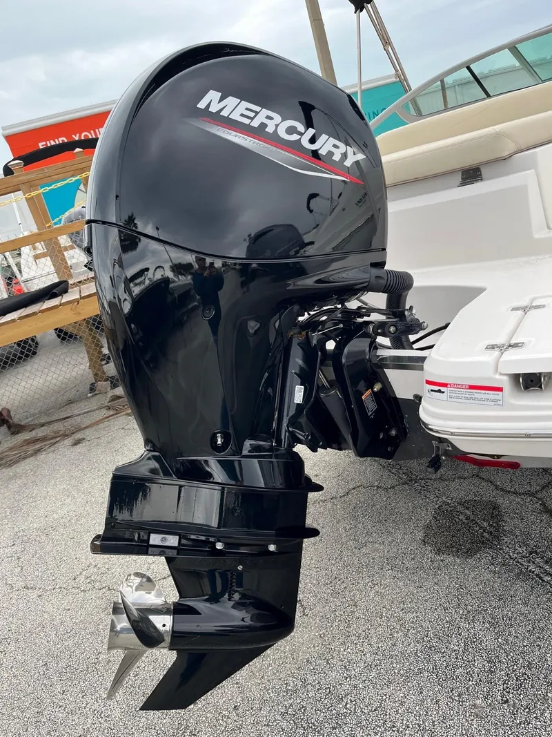 Slide: The Image of 2019 Regal 21 OBX boat with Mercury outboard motor. - 11