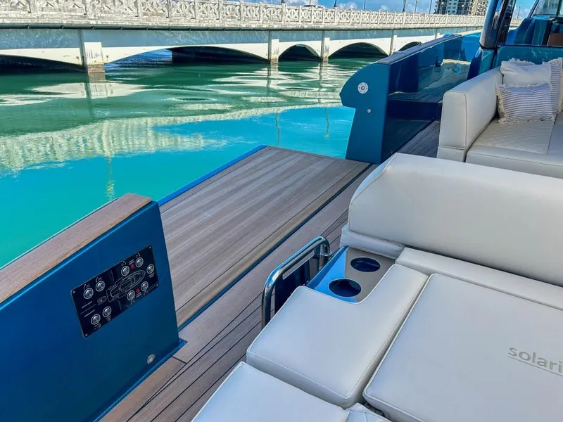 Slide: The Image of 2024 Solaris Power 52 Open yacht with luxurious seating and scenic water view. - 42