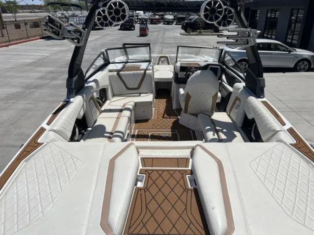 Slide: The Image of 2019 Tigé RZX2 boat interior with luxurious seating and modern design. - 23