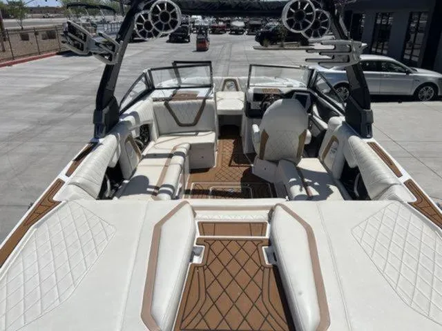 Slide: The Image of 2019 Tigé RZX2 boat interior with luxurious seating and advanced audio system. - 39