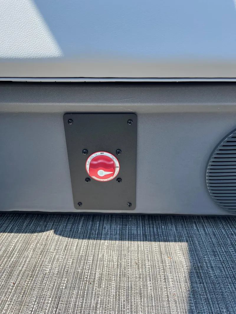 Slide: The Image of 2024 Bennington SV Line boat detail with red safety switch and speaker. - 10