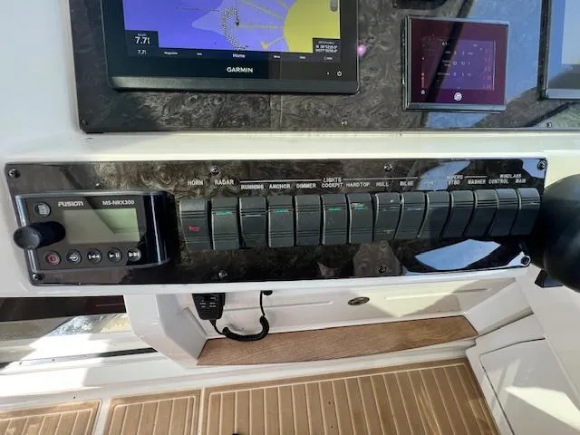 Slide: The Image of Control panel of a 2010 Sea Ray 450 Sundancer with Garmin navigation system. - 21