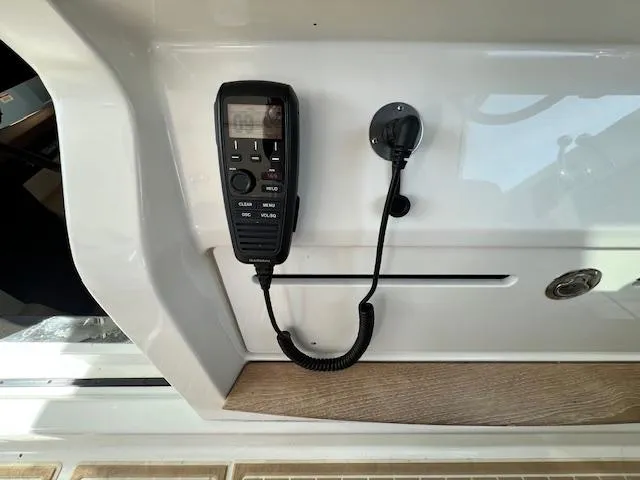 Slide: The Image of VHF radio on a 2010 Sea Ray 450 Sundancer yacht. - 22