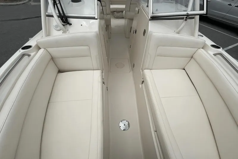 Slide: The Image of 2023 Grady-White Freedom 275 boat interior with spacious seating and sleek design. - 17