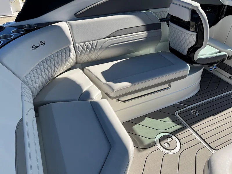 Slide: The Image of Luxurious seating on 2023 Sea Ray SLX 260 Outboard boat with elegant design and detailing. - 8