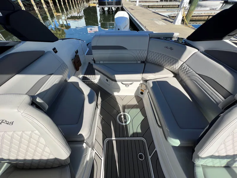 Slide: The Image of Luxurious interior of 2023 Sea Ray SLX 260 Outboard boat at dock. - 9