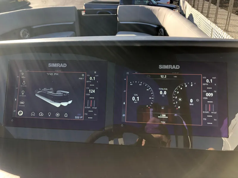 Slide: The Image of Simrad display on 2023 Harris Solstice 250 boat dashboard, showing navigation and engine data. - 15
