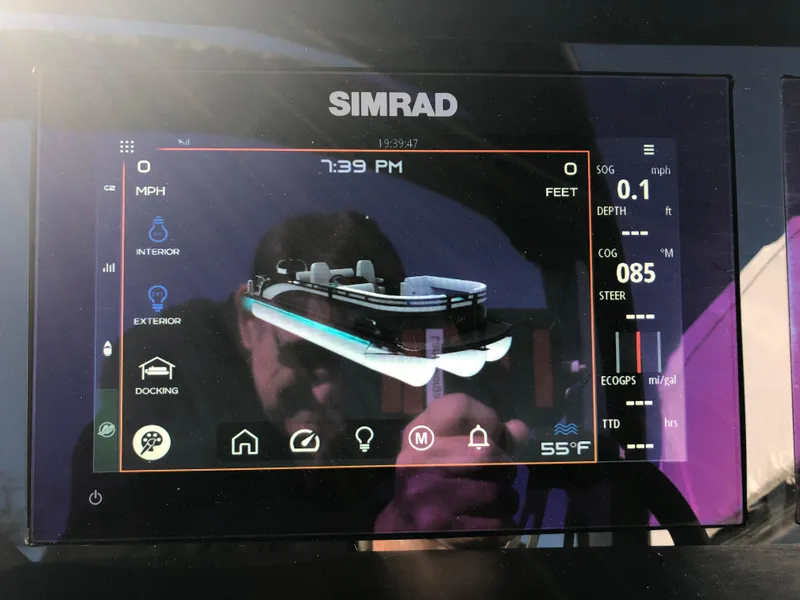 Slide: The Image of Simrad display on 2023 Harris Solstice 250 boat dashboard showing navigation and control settings. - 16