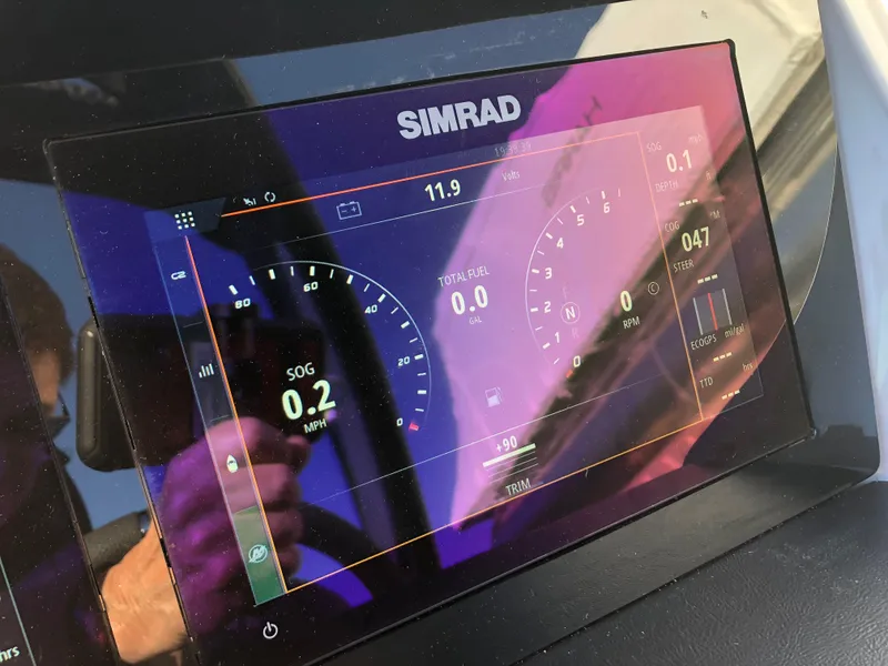 Slide: The Image of Simrad display on 2023 Harris Solstice 250 showing navigation and performance data. - 18