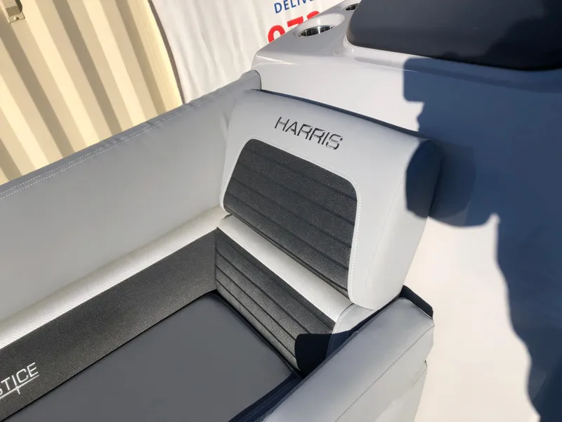 Slide: The Image of 2023 Harris Solstice 250 boat seat with sleek gray upholstery. - 26