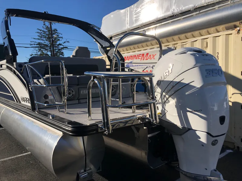 Slide: The Image of 2023 Harris Solstice 250 pontoon boat with powerful Mercury 350 engine. - 29