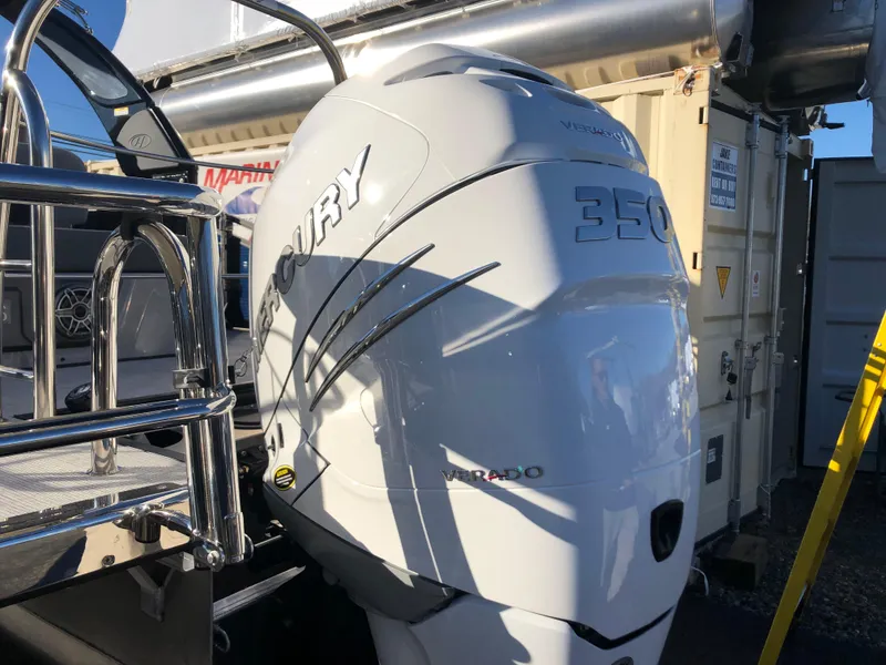 Slide: The Image of 2023 Harris Solstice 250 with Mercury 350 Verado engine, docked outdoors. - 30