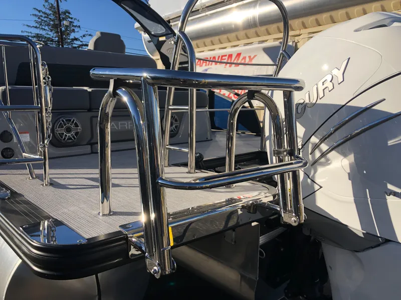 Slide: The Image of 2023 Harris Solstice 250 boat with Mercury engine and stainless steel ladder. - 31
