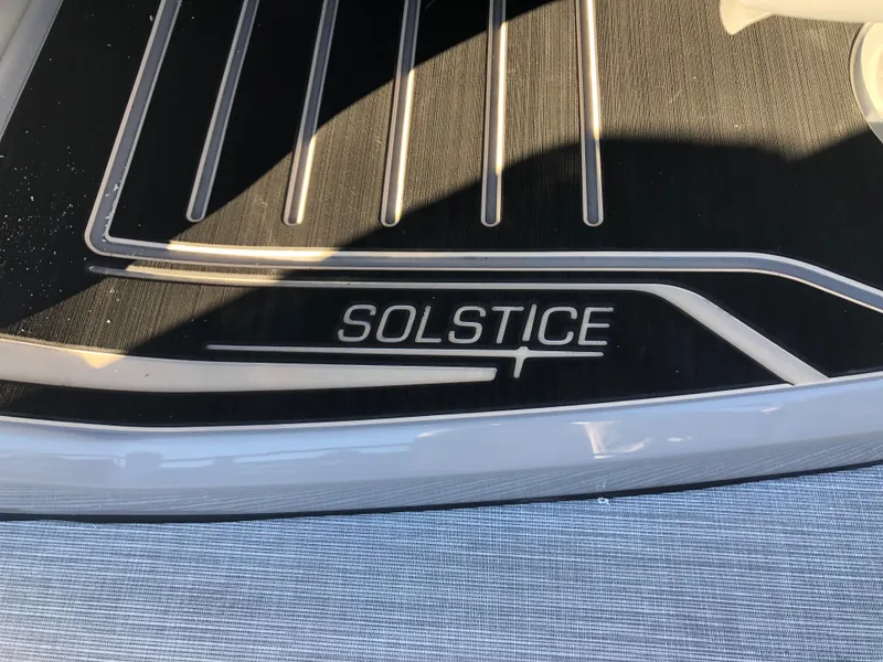 Slide: The Image of 2023 Harris Solstice 250 boat deck with logo detail. - 33