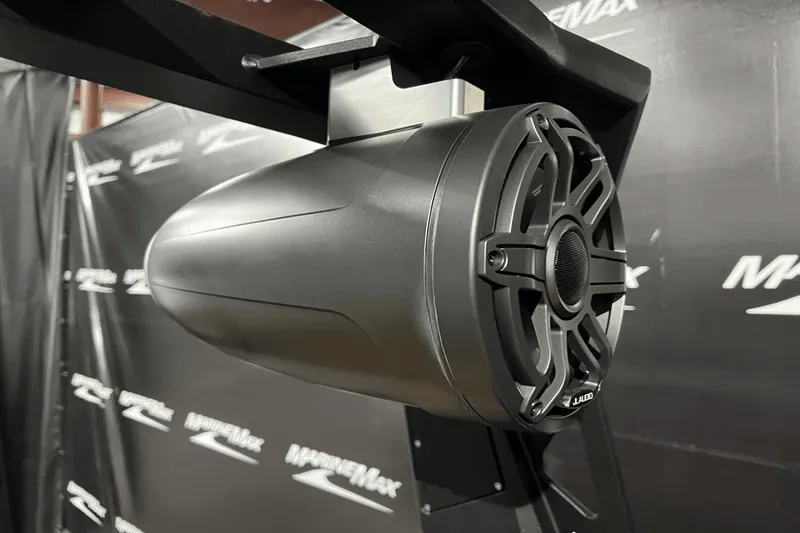 Slide: The Image of Close-up of a 2023 Nautique Super Air Nautique S25 speaker system. - 18