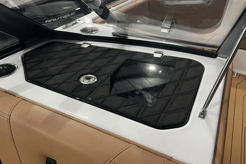 Slide: The Image of 2023 Nautique Super Air Nautique S25 interior detail with black diamond-patterned panel. - 20