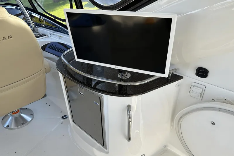 Slide: The Image of Interior of 2015 Meridian 441 Sedan with TV and control panel. - 15