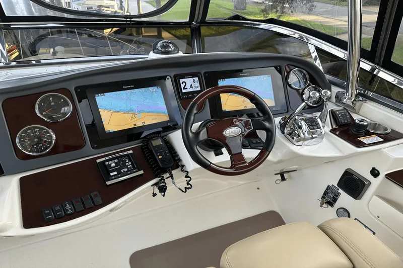 Slide: The Image of Helm of 2015 Meridian 441 Sedan with navigation screens and controls. - 17